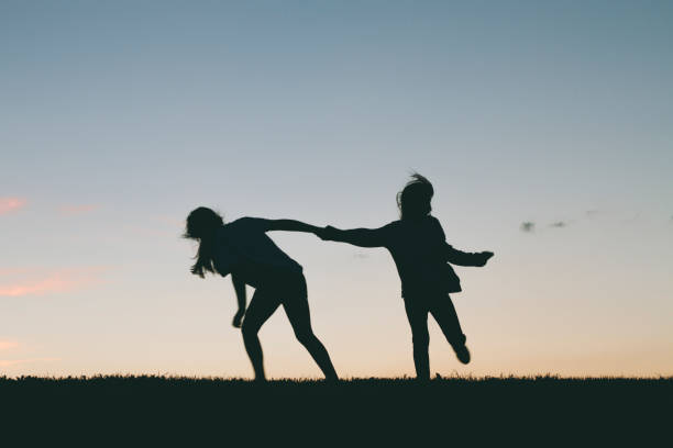istock Little girls playing 918695366