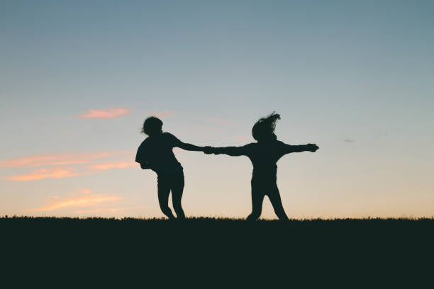 istock Little girls playing 918695372