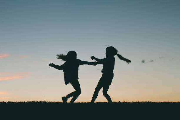 istock Little girls playing 918695374