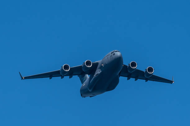 Air Force Cargo Jet US Air Force Cargo jet photographed against a clear, blue sky us air force photos stock pictures, royalty-free photos & images