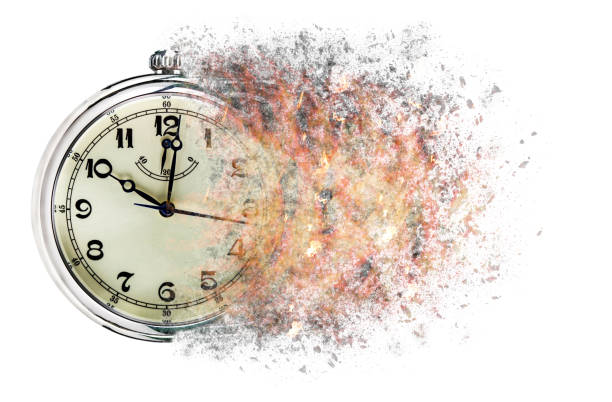istock Time is running out concept shows clock that is dissolving away into little particles. 918703506