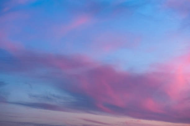 istock Sky background or texture at the sunset time with clouds. Copy space 918704040