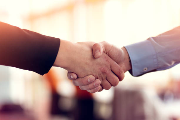 istock Successful business people handshaking closing a deal 918711098