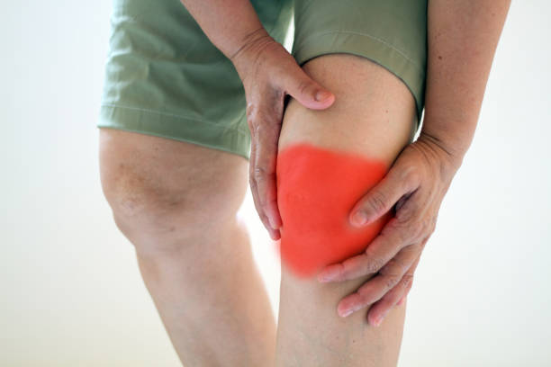 istock Midsection Of Man With Knee Pain Against White Background 918714640