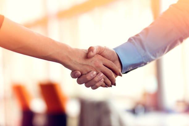 istock Successful business people handshaking closing a deal 918718626