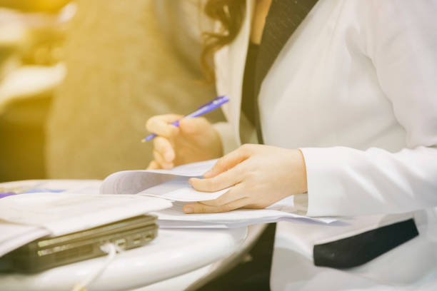 istock Midsection Of Businesswoman Working At Table 918718788