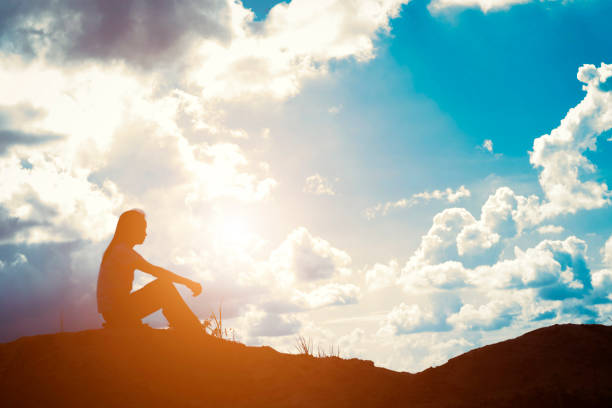 istock Sad woman sitting alone. 918726858