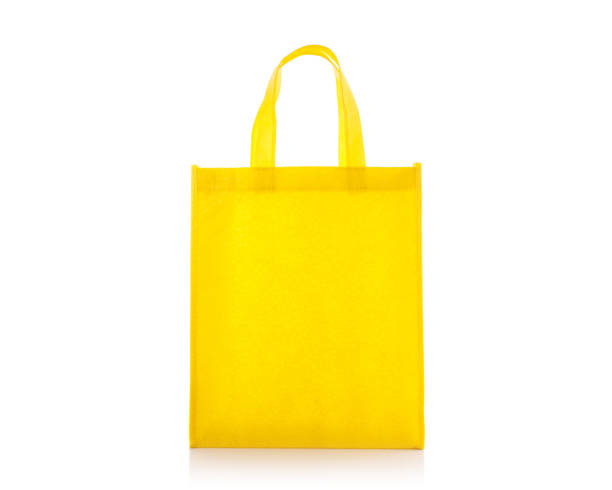 istock Yellow cotton bag. Studio shot isolated on white 918730120