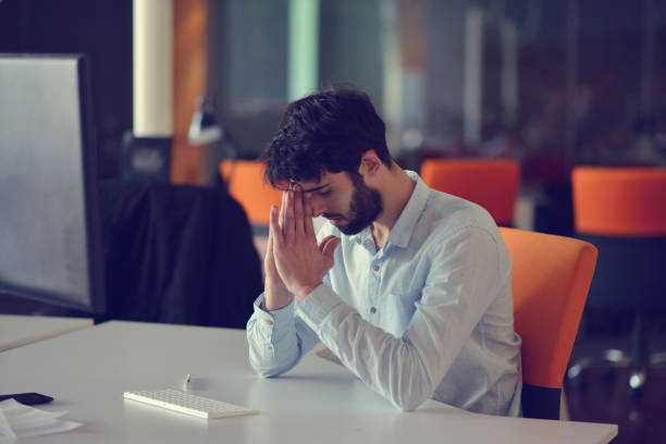 istock business, startup and people concept - businessman or creative male office worker with computer 918732796