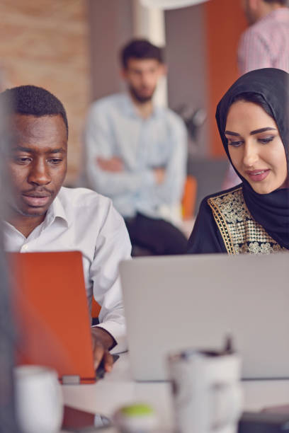 istock Group Young Coworkers Making Great Business Decisions.Creative Team Discussion Corporate Work Concept Modern Office. 918734308