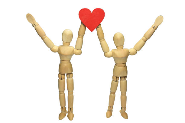 istock Heart and two people 918739624