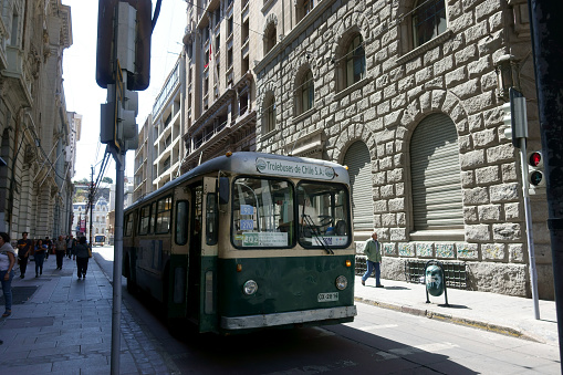 Valparaiso, Chile - January 17, 2018: the old tram runs on the city streets of Valparaiso. Old trolleybus system from 1950 's is one of the icons of Valparaiso city.