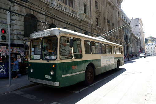 Valparaiso, Chile - January 17, 2018: the old tram runs on the city streets of Valparaiso. Old trolleybus system from 1950 's is one of the icons of Valparaiso city.