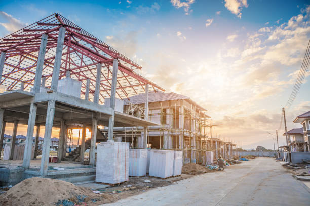 construction residential new house in progress at building site construction residential new house in progress at building site construction material photos stock pictures, royalty-free photos & images