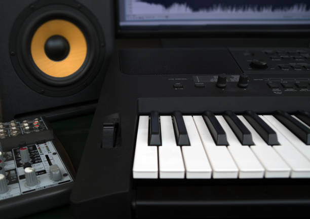 istock Home recording studio with professional monitors and midi keyboard. 918757740
