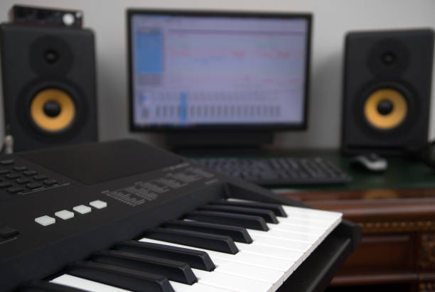 istock Home recording studio with professional monitors and midi keyboard. 918757766