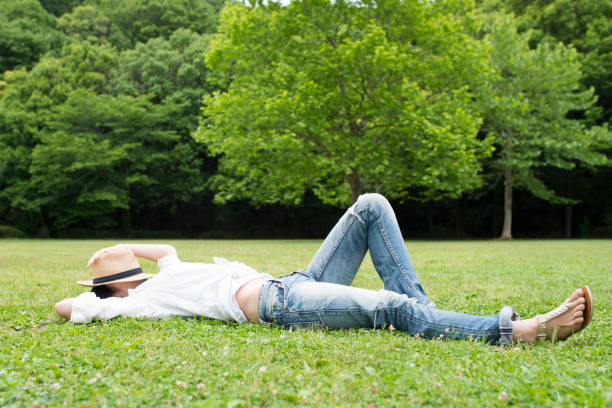 beautiful Japanese woman is relaxing in the park