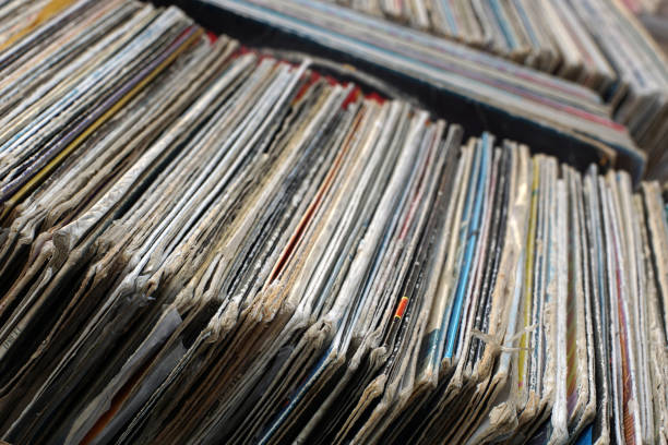 istock Stack of used vinyl records in covers put on sale 918767520