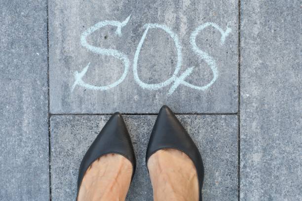 istock Woman and the word sos 918785574