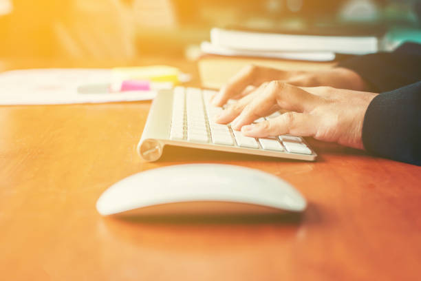 istock Hands of an office woman typing and work. 918798970
