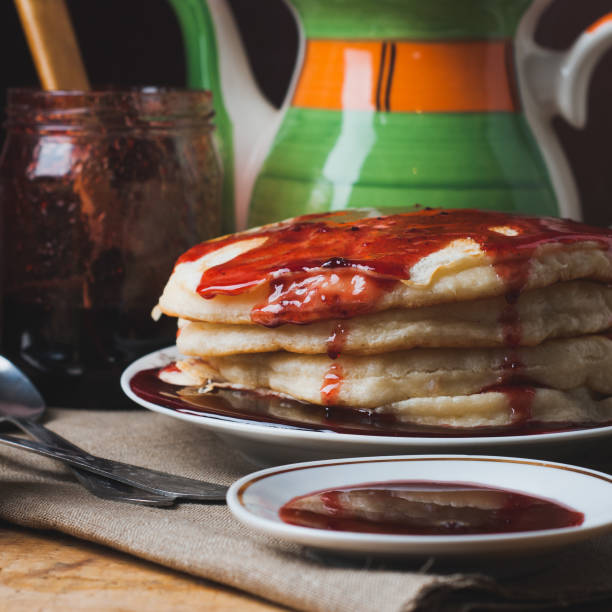 istock Pancakes with sweet syrup, rustic pancakes, 918802350