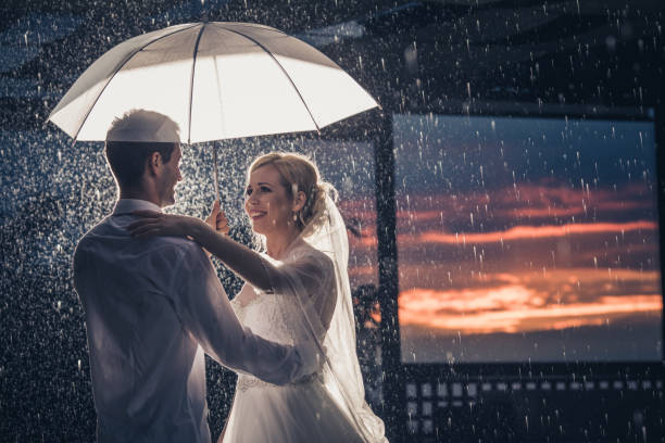 istock Even heavy rain can't ruin our love! 918803450