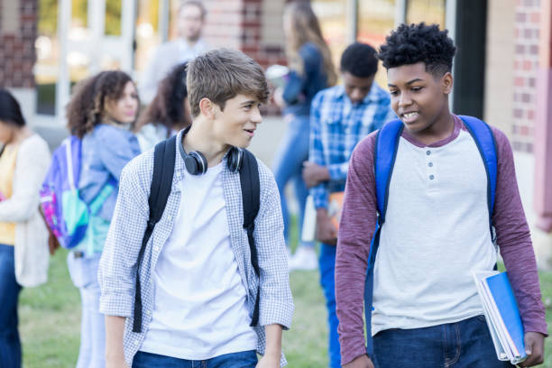 istock Teenage boys walking to class together 918805680