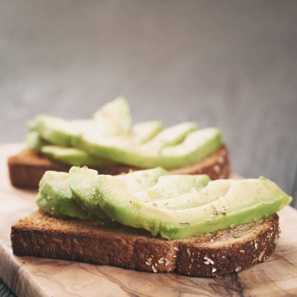 istock open sandwiches with avocado and spices 918807020