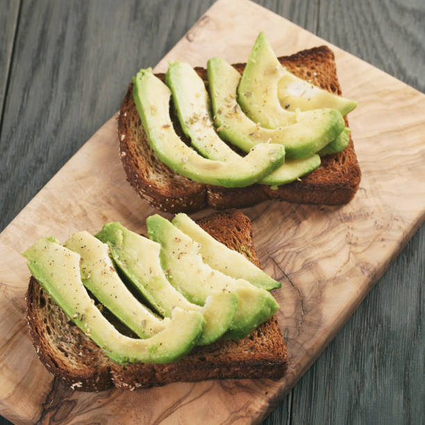 istock open sandwiches with avocado and spices 918807028