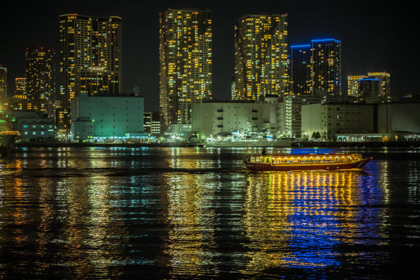 Night view just after sunset, with a ship in Tokyo Bay. A beautiful moment in Tokyo.