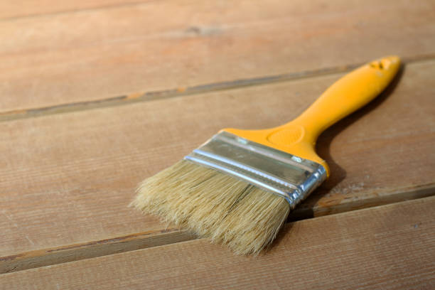 istock Paint brush on the wooden floor 918813626