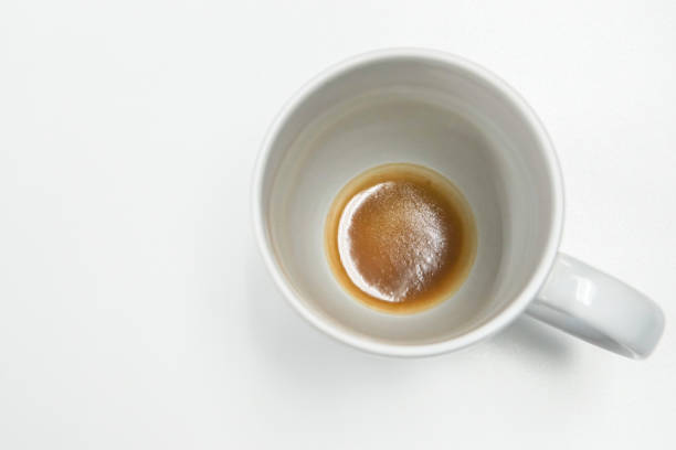 istock isolated white mug with coffee residue at bottom 918814444