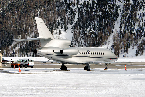 A private jet in the airport of in the alps switzerland in winter