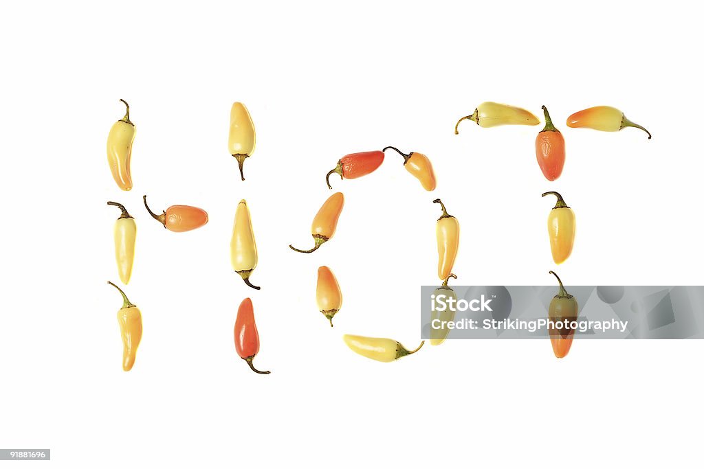 Chili Peppers ortografia fora da palavra H O T - Royalty-free Amarelo Foto de stock