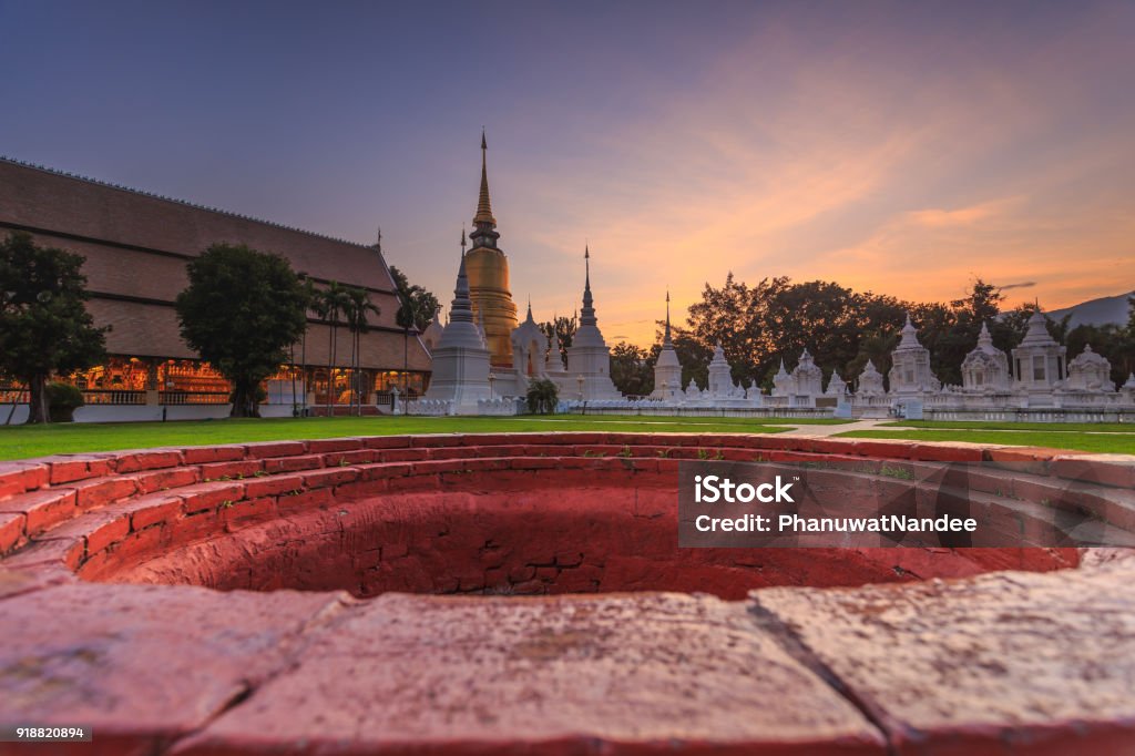 Beautiful sunset at Wat Suan Dok. Buddhist temple (Wat) in Chiang Mai, Northern of Thailand Ancient Stock Photo