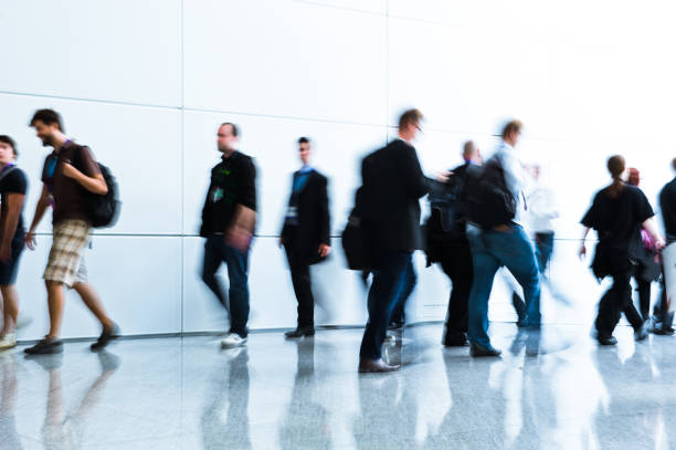 istock blurred people business concept 918828922