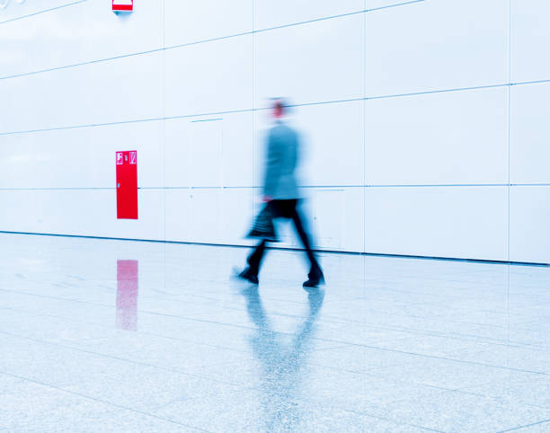 istock blurred people business concept 918828930