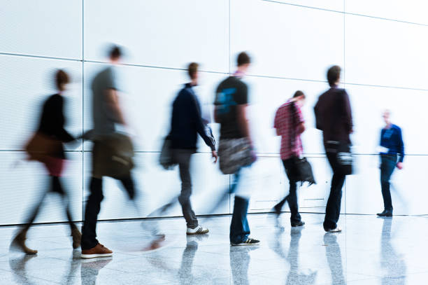istock blurred people business concept 918828946