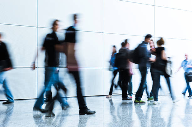istock blurred people business concept 918828970
