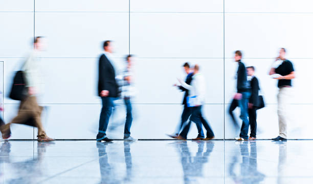 istock blurred people business concept 918828976