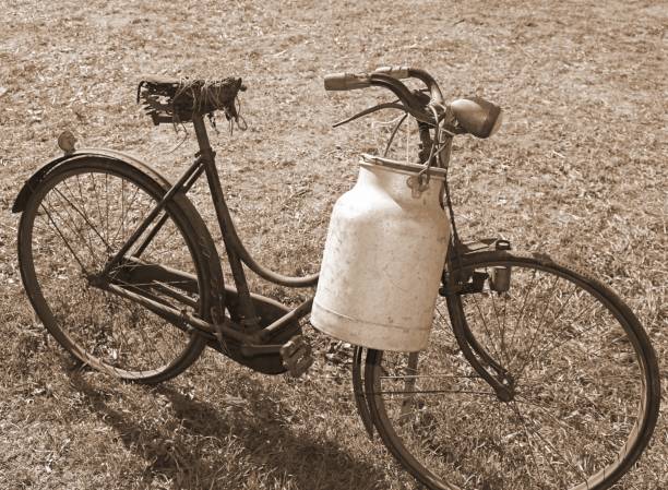 istock bicycle with aluminum milk bin to carry milk 918829584
