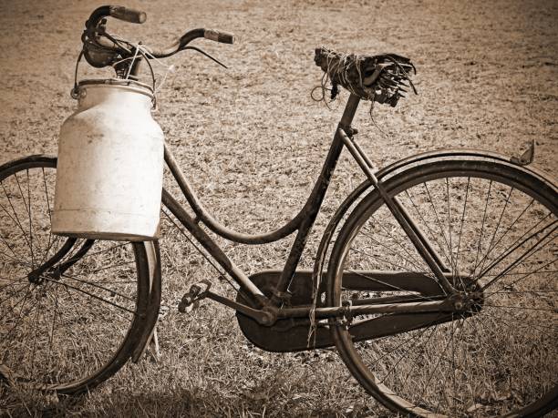 istock milking bike with milk bin with vintage effect 918832444