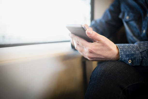 istock Close up of a woman using mobile smart phone. 918832492