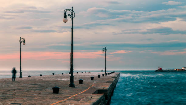 wietrzny dzień w mieście triest - lighthouse storm sea panoramic zdjęcia i obrazy z banku zdjęć