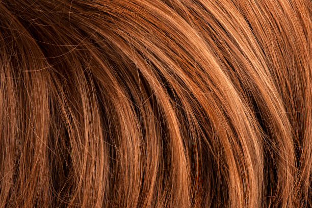istock Red human hair 918844316