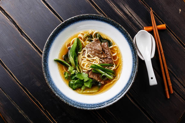istock Ramen asian noodle in broth with Beef and pak choi cabbage 918851072