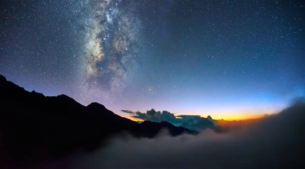 istock Night landscape with bright young moon and milky way 918851582