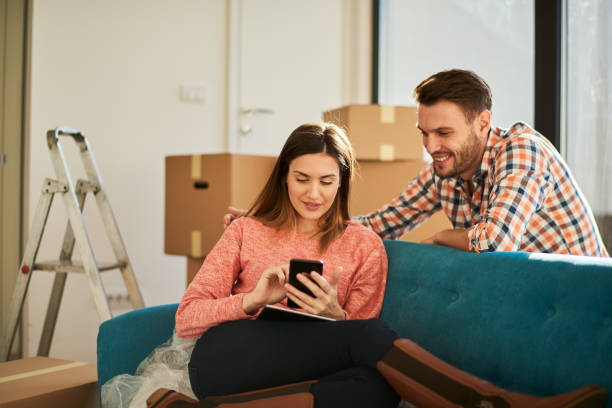 istock Couple in new apartment 918851818
