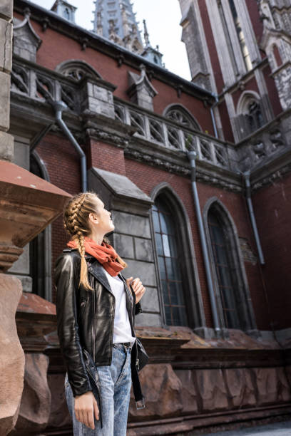 istock thoughtful woman on street 918854594