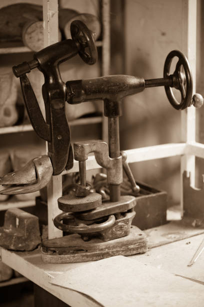 istock old machine in a shoemaking, black and white 918873372